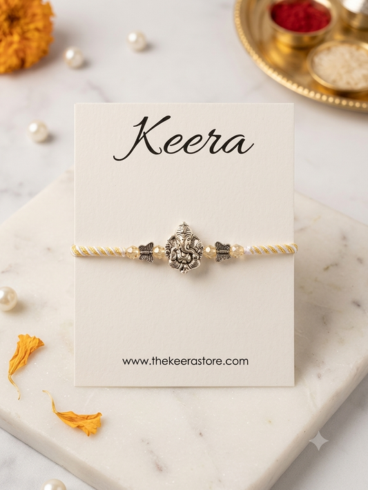 Pastel Ganpati Dori Rakhi - Yellow